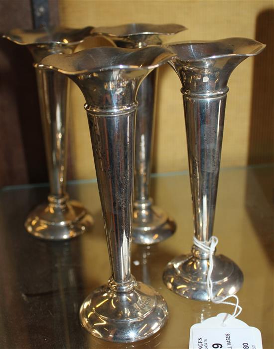 4 silver spill vases